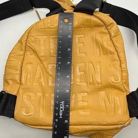 Steve Madden Yellow Embossed Logo Mini Backpack Mustard Tassel -corner peeling - Picture 6 of 11